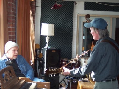 [Bill and Dave Alvin in the studio]